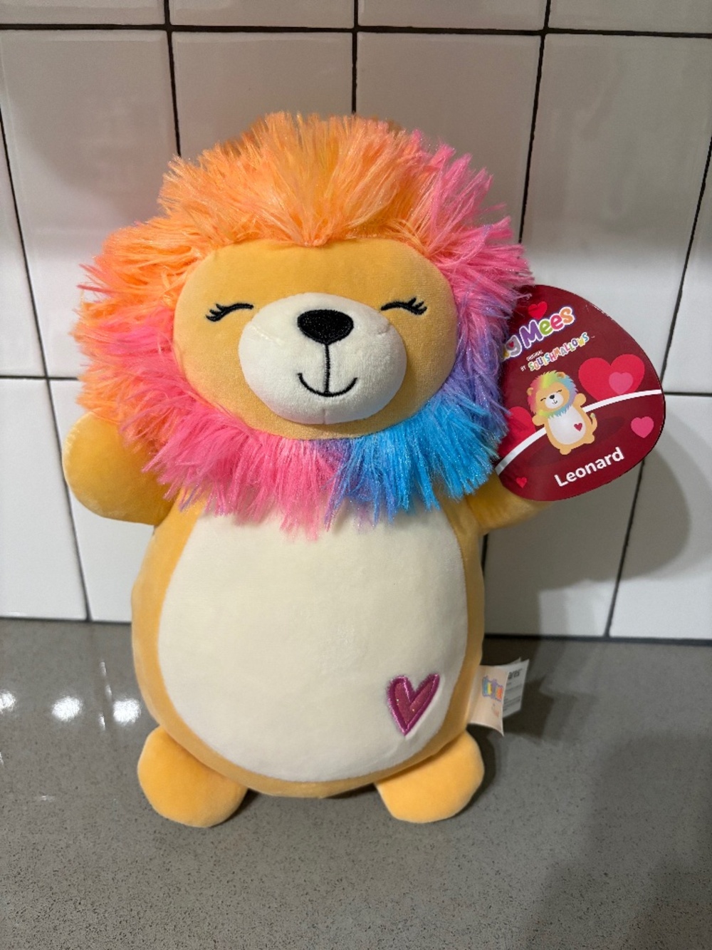 NWT Squishmallow Hug Mees - “Leonard” rainbow lion born on 8/8/23